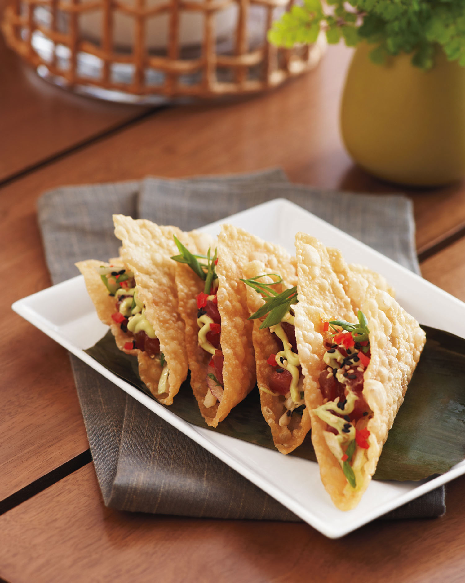 TommyBahamaAhiTunaTacos Recipe for Tommy Bahama's Fresh Ahi Tacos with Asian slaw, wasabi avocado salsa and lime vinaigrette.