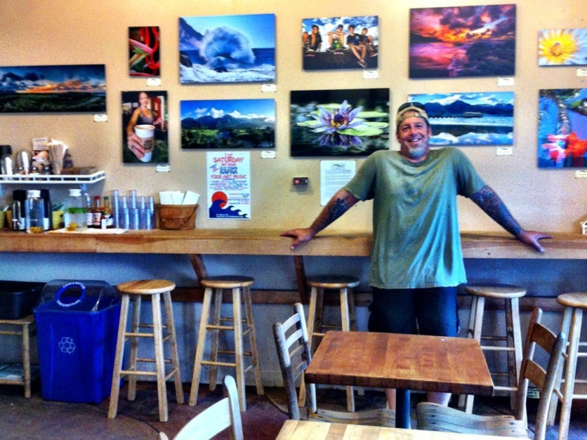 Dan Lane posing a restaurant on Kauai, Hawaii