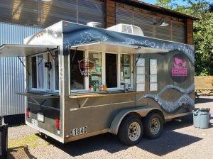 a truck is parked in front of a building