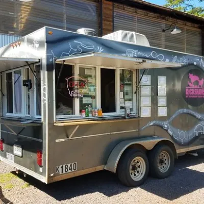 a truck is parked in front of a building