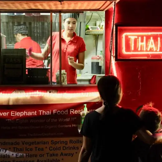 a person standing in front of a store